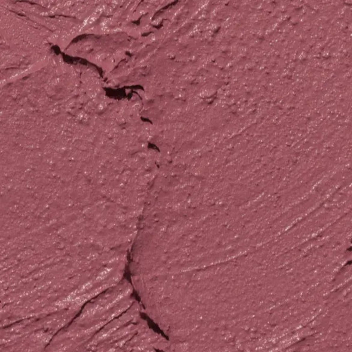 Nahaufnahme eines rauchig-roséfarbenen Lippenstift-Texturstrichs.